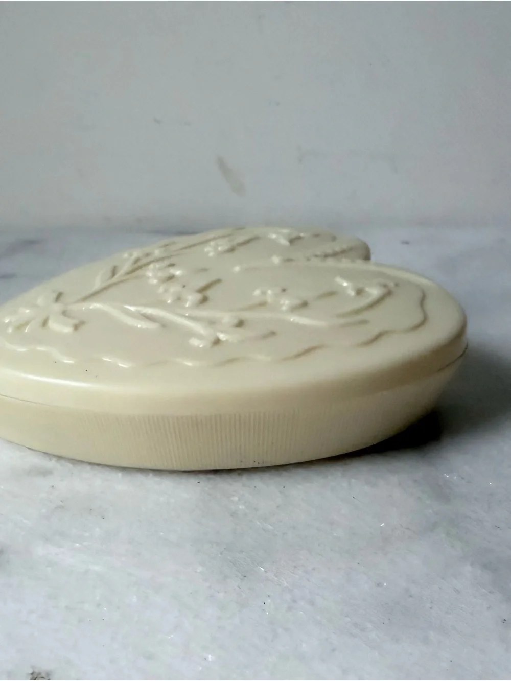 vintage Art Deco-style cream celluloid heart-shaped jewelry box